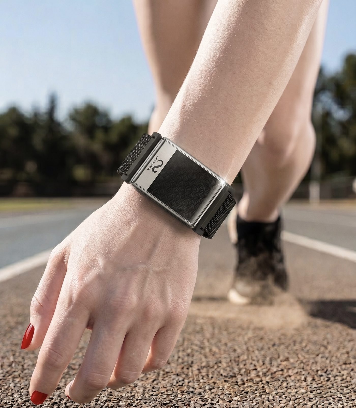 Runner at the start line wearing the Harmony Band